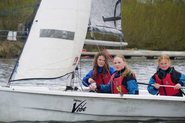 Young people on a sailing boat