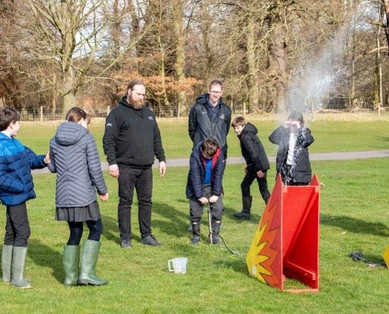 A plastic bottle rocket being launched